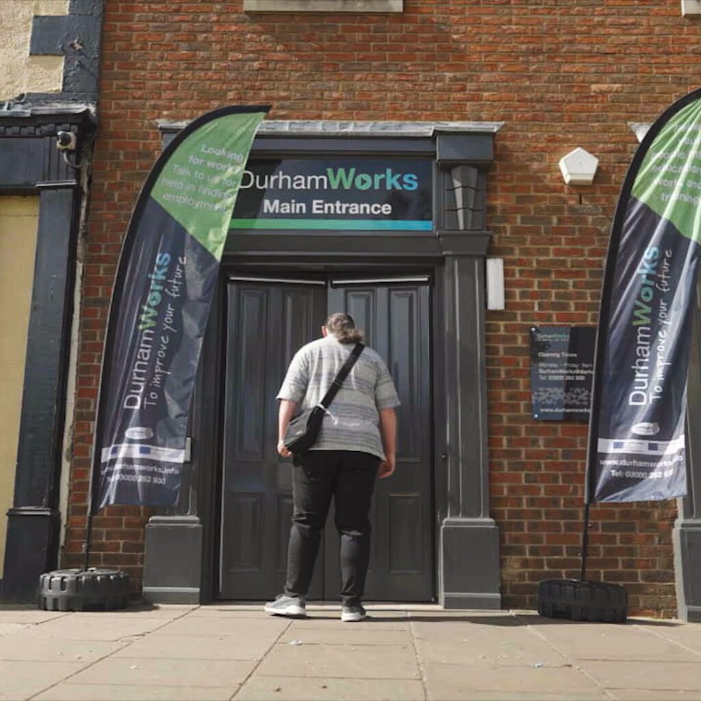 A DurhamWorks client stands at the front of the DurhamWorks Employability Hub