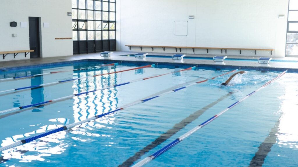 Poolside at an indoor swimming centre.