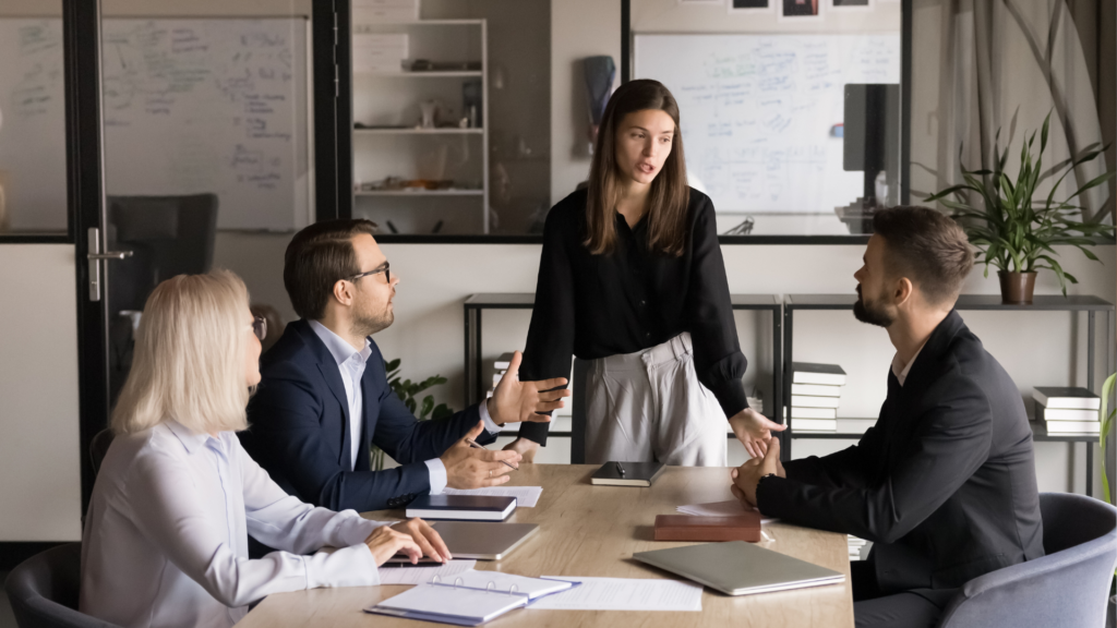 Young and diverse group of people holding a business meeting.